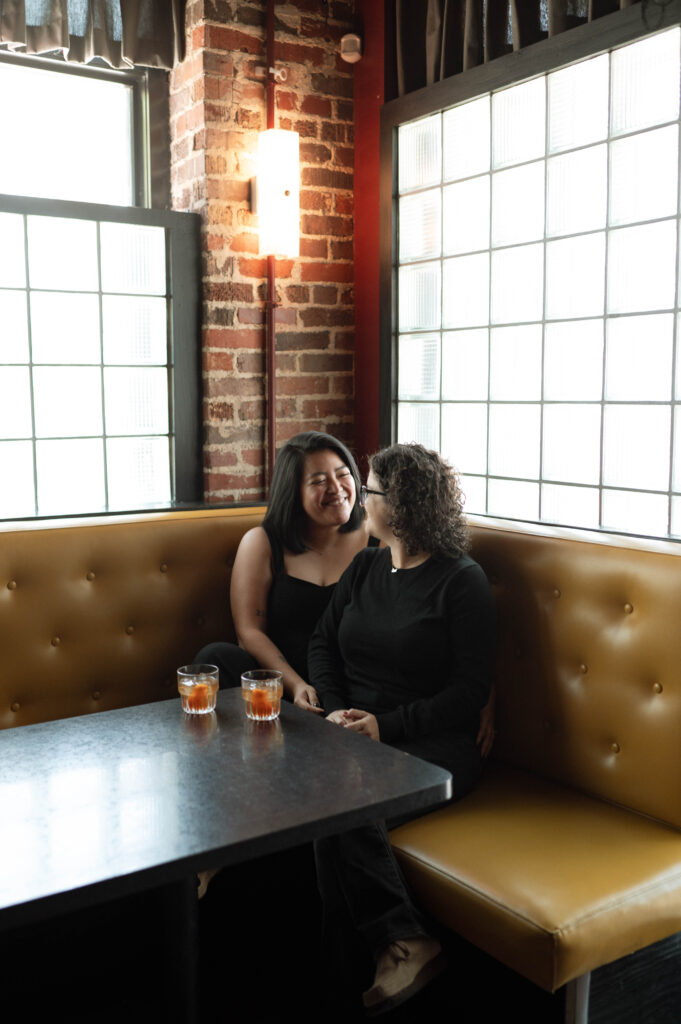 Romantic couple during engagement session in Nickel City taken by DFW wedding photographer Nicole Endress Photography