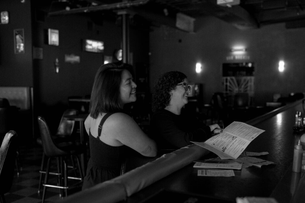 Couple ordering drinks at Nickel City in Fort Worth, TX taken by Nicole Endress Photography