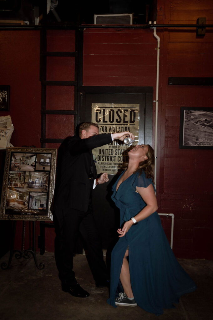 groom and his sister having fun by DFW Wedding Photographer 