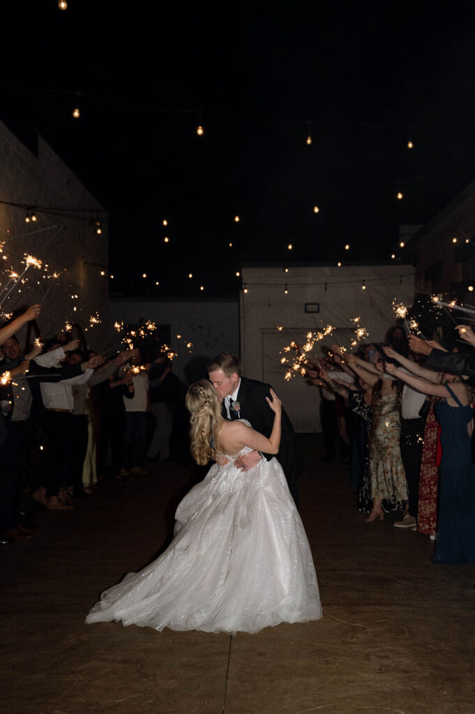 sparkler send off for bride & groom by Illinois wedding photographer