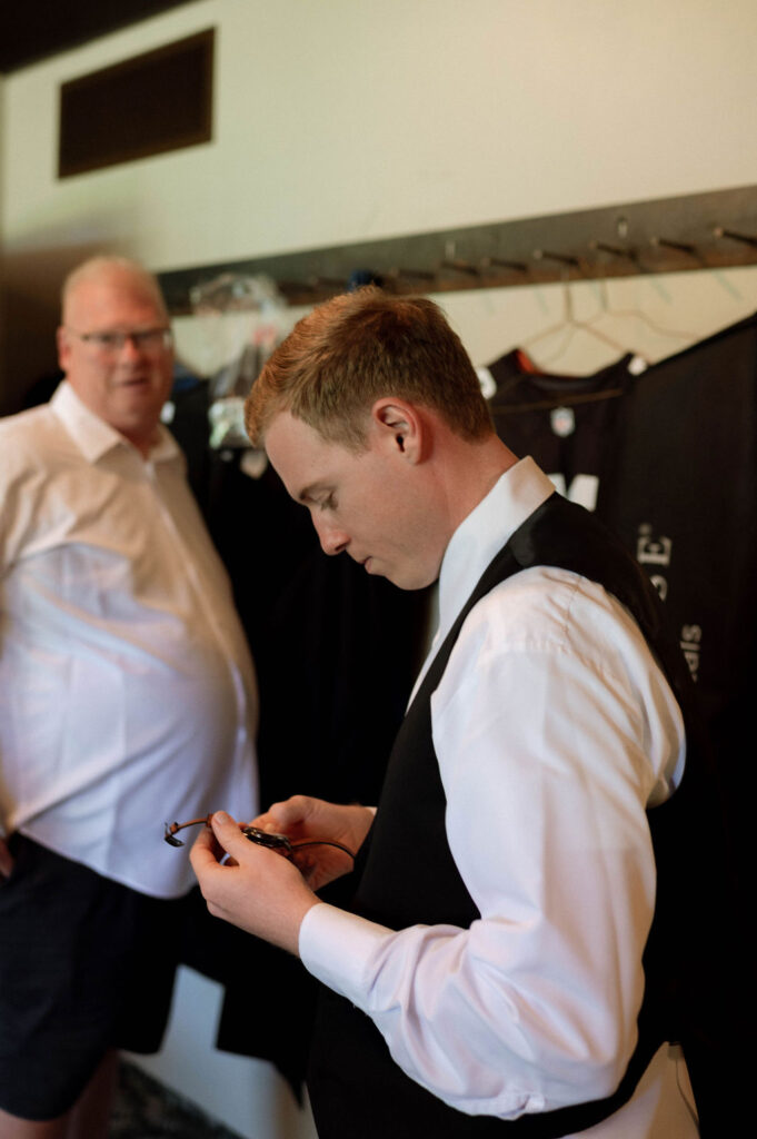 groom getting ready by Illinois wedding photographer