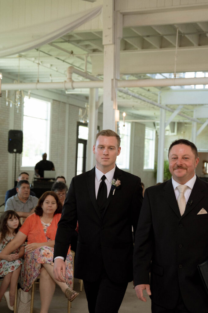 groom walking down the aisle by Illinois wedding photographer