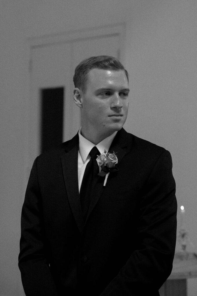 groom looking at his bride by Illinois wedding photographer