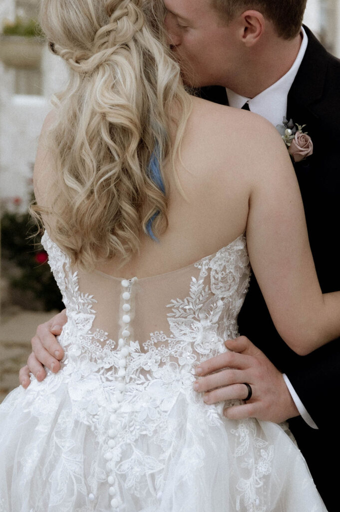 bride & groom being romantic by DFW Wedding Photographer 