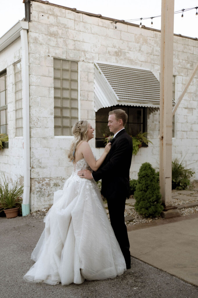 bride & groom laughing together by Illinois wedding photographer