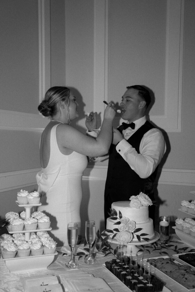 eating cake taken by Dallas Wedding Photographer Nicole Endress Photography