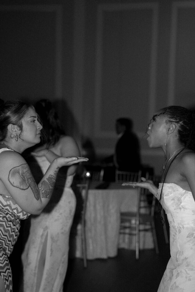 wedding guests dancing taken by Dallas Wedding Photographer Nicole Endress Photography