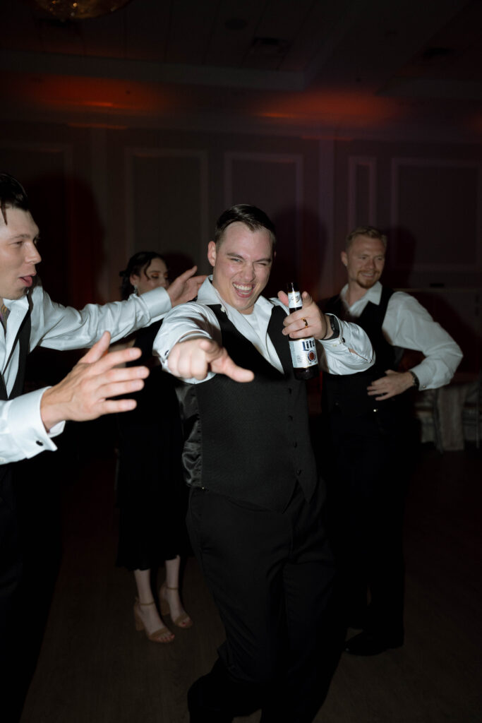 groom on the dance floor taken by Dallas Wedding Photographer Nicole Endress Photography