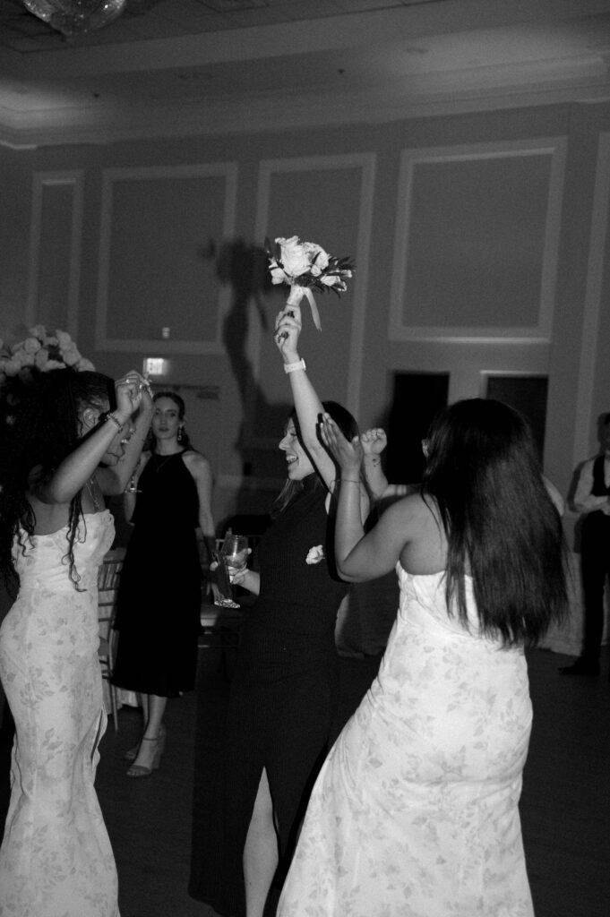 guest catching bouquet