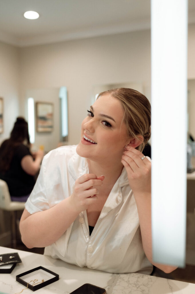 bride getting ready taken by Dallas Wedding Photographer Nicole Endress Photography