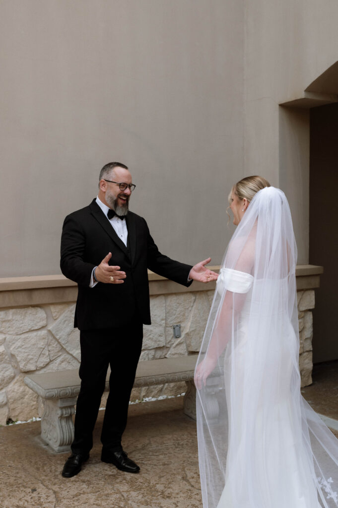 bride's first look with her father taken by Dallas Wedding Photographer Nicole Endress Photography