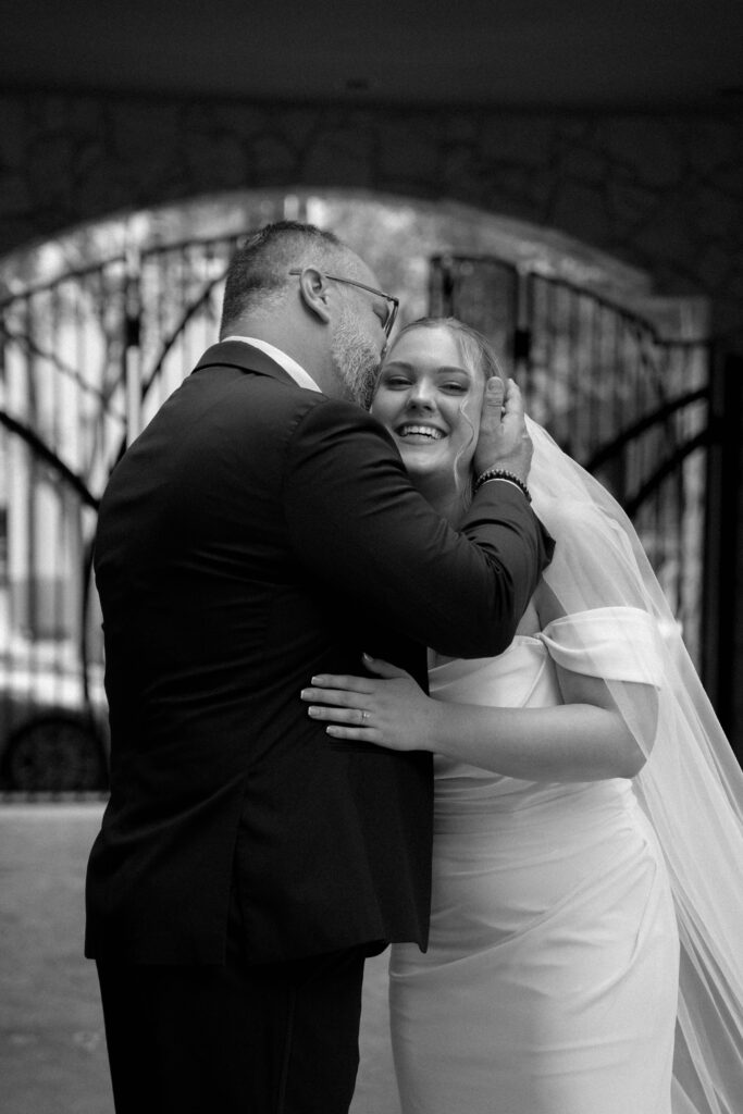 bride hugging her father taken by Dallas Wedding Photographer Nicole Endress Photography