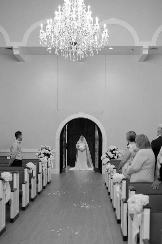 bride getting ready to walk down the aisle taken by Dallas Wedding Photographer Nicole Endress Photography