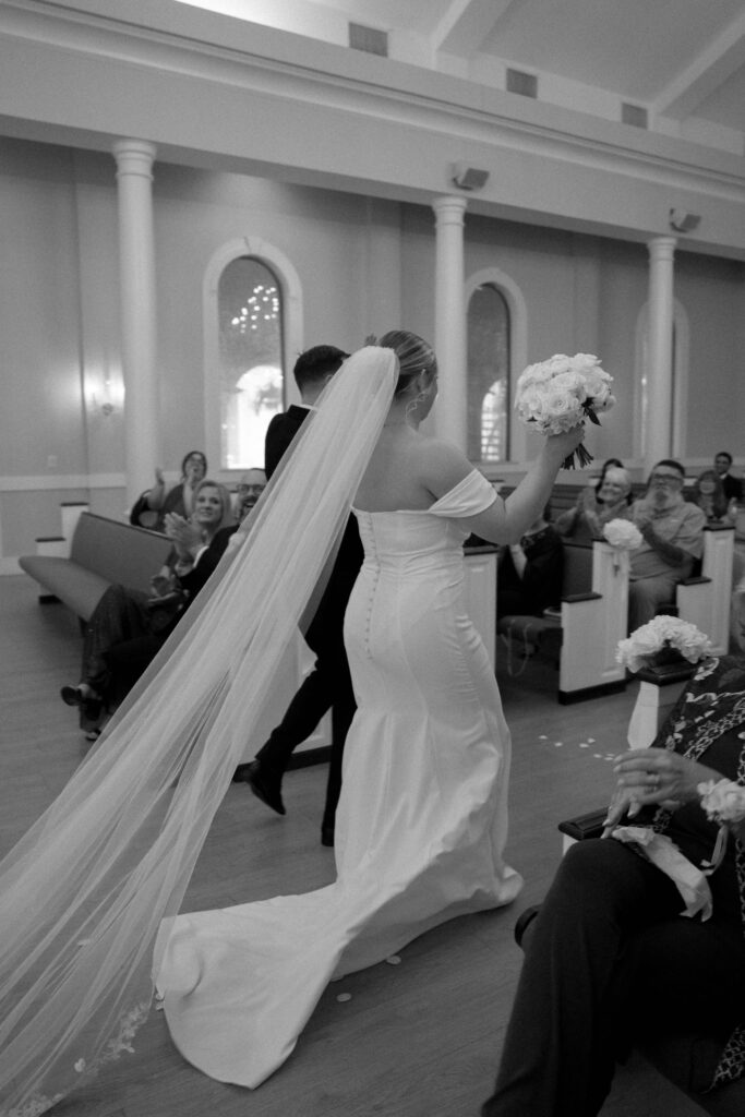 bride and groom walking down the aisle