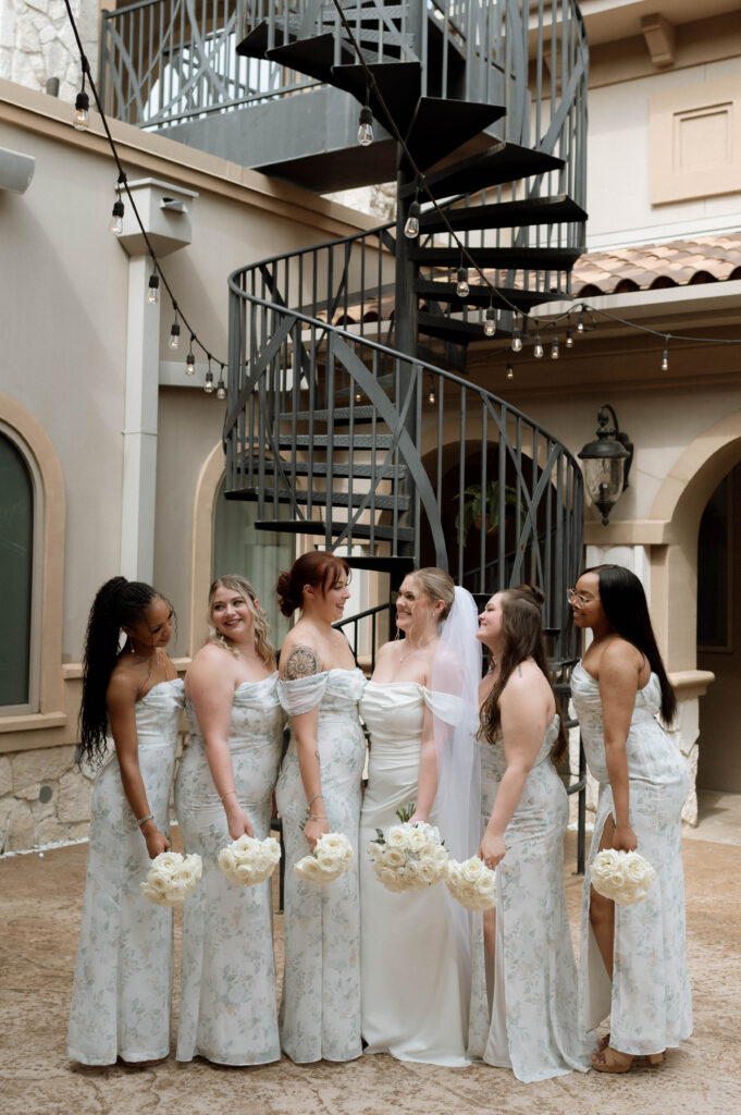 bride and bridesmaids giggling taken by Dallas Wedding Photographer Nicole Endress Photography