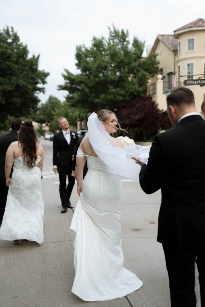 bride walking taken by Dallas Wedding Photographer Nicole Endress Photography