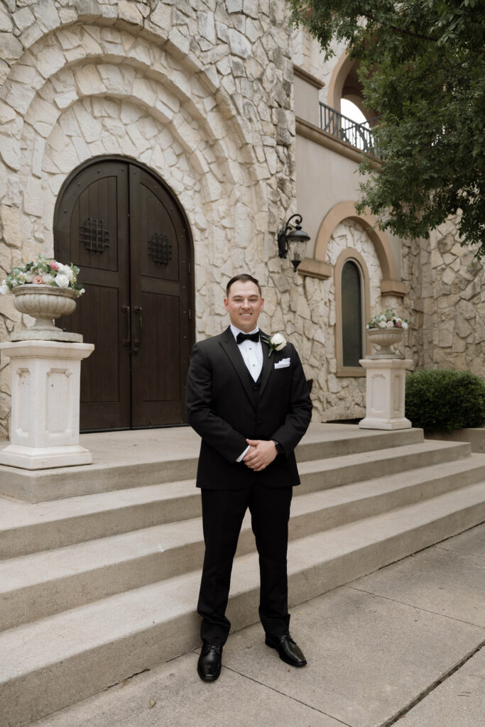 groom smiling taken by Dallas Wedding Photographer Nicole Endress Photography