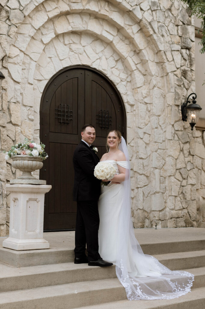 bride and groom in front of Aristide Colleyville taken by Dallas Wedding Photographer Nicole Endress Photography