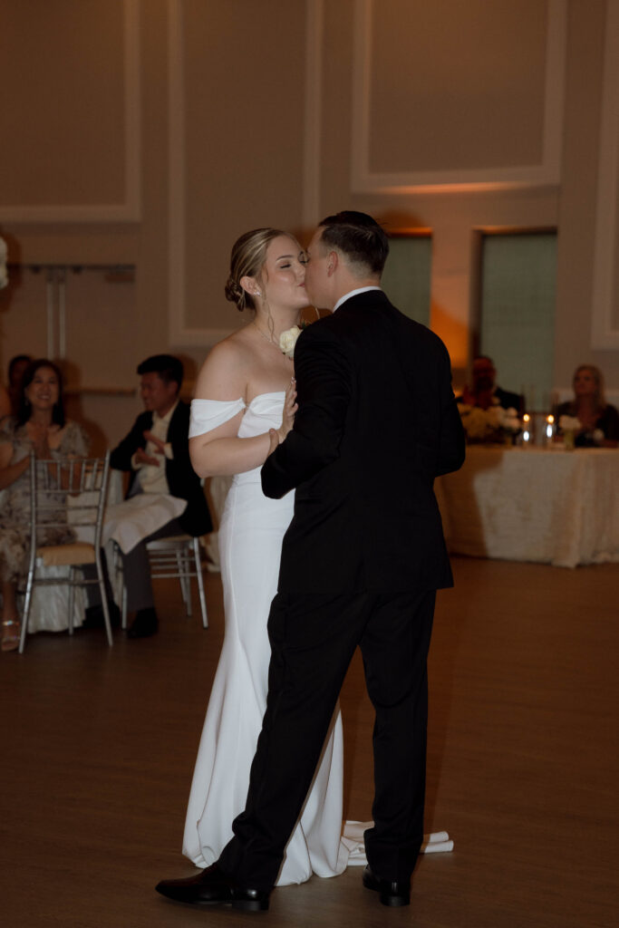 bride and groom kissing and dancing taken by Dallas Wedding Photographer Nicole Endress Photography