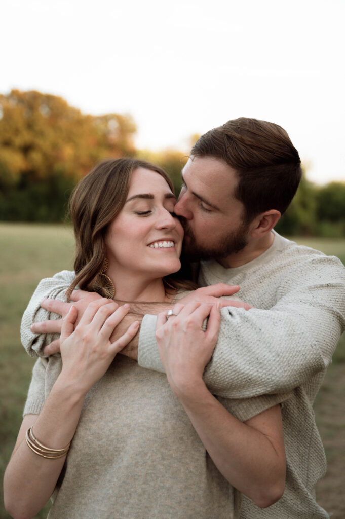 couple kissing during DFW Engagement Photos