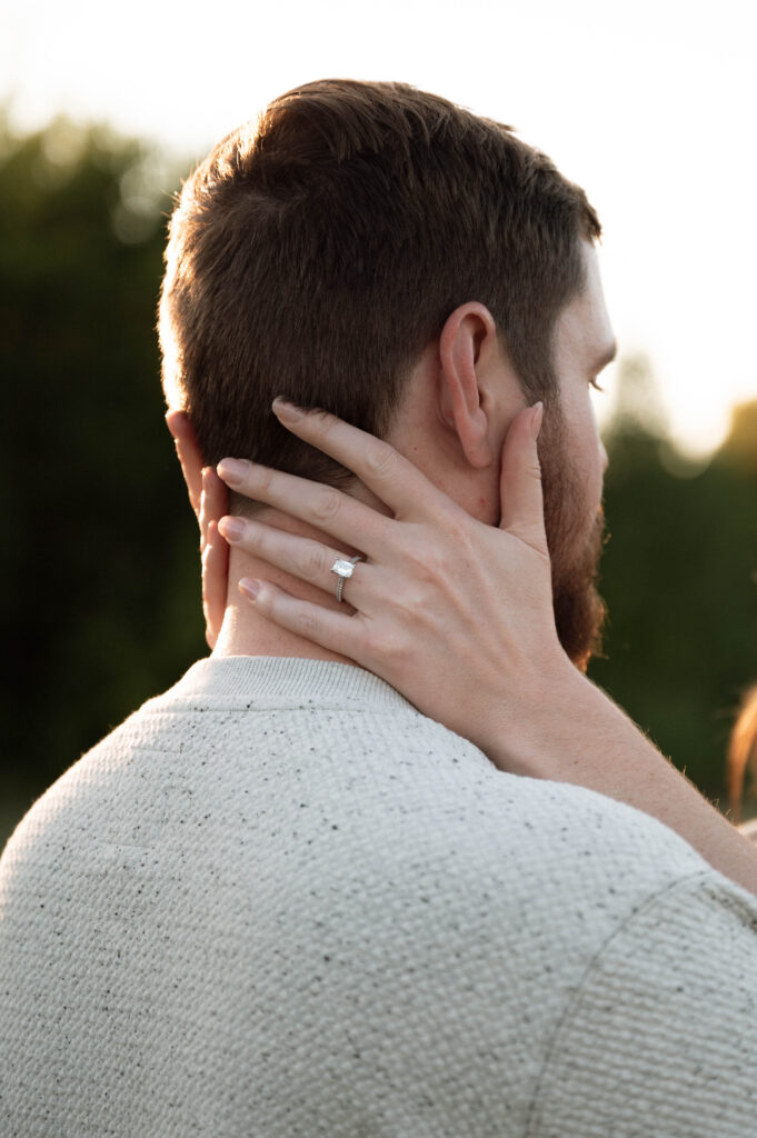 closeup of engagement ring during engagement photos in DFW