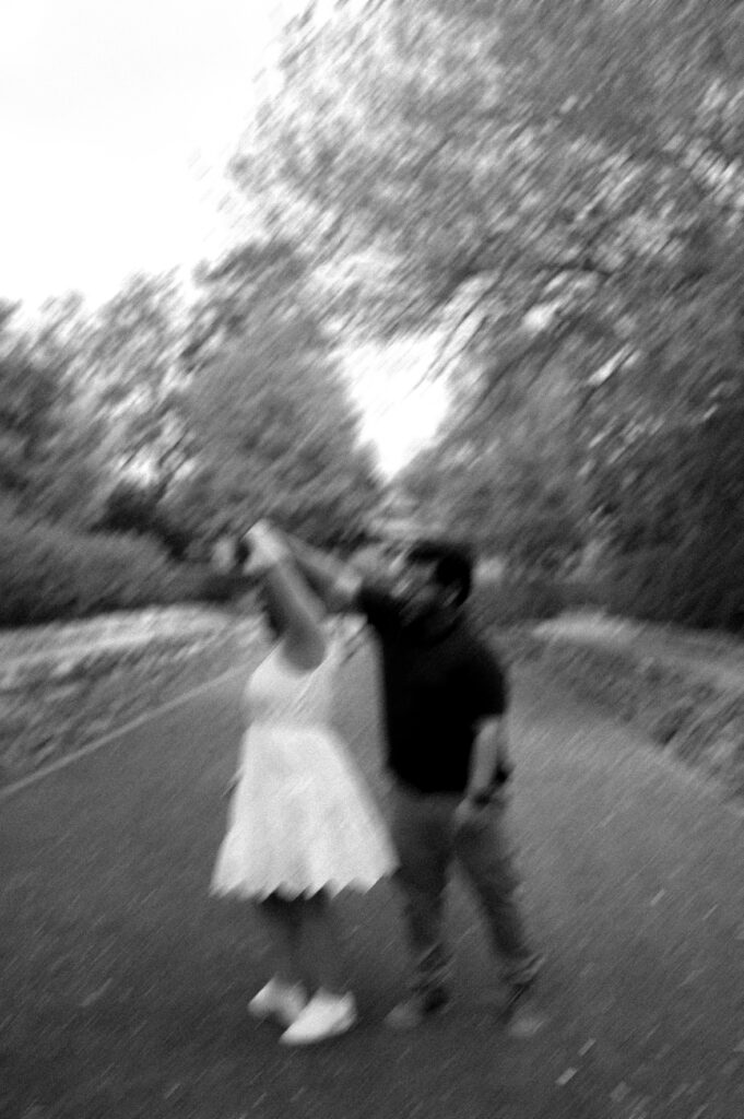 motion blur black and white engagement photo