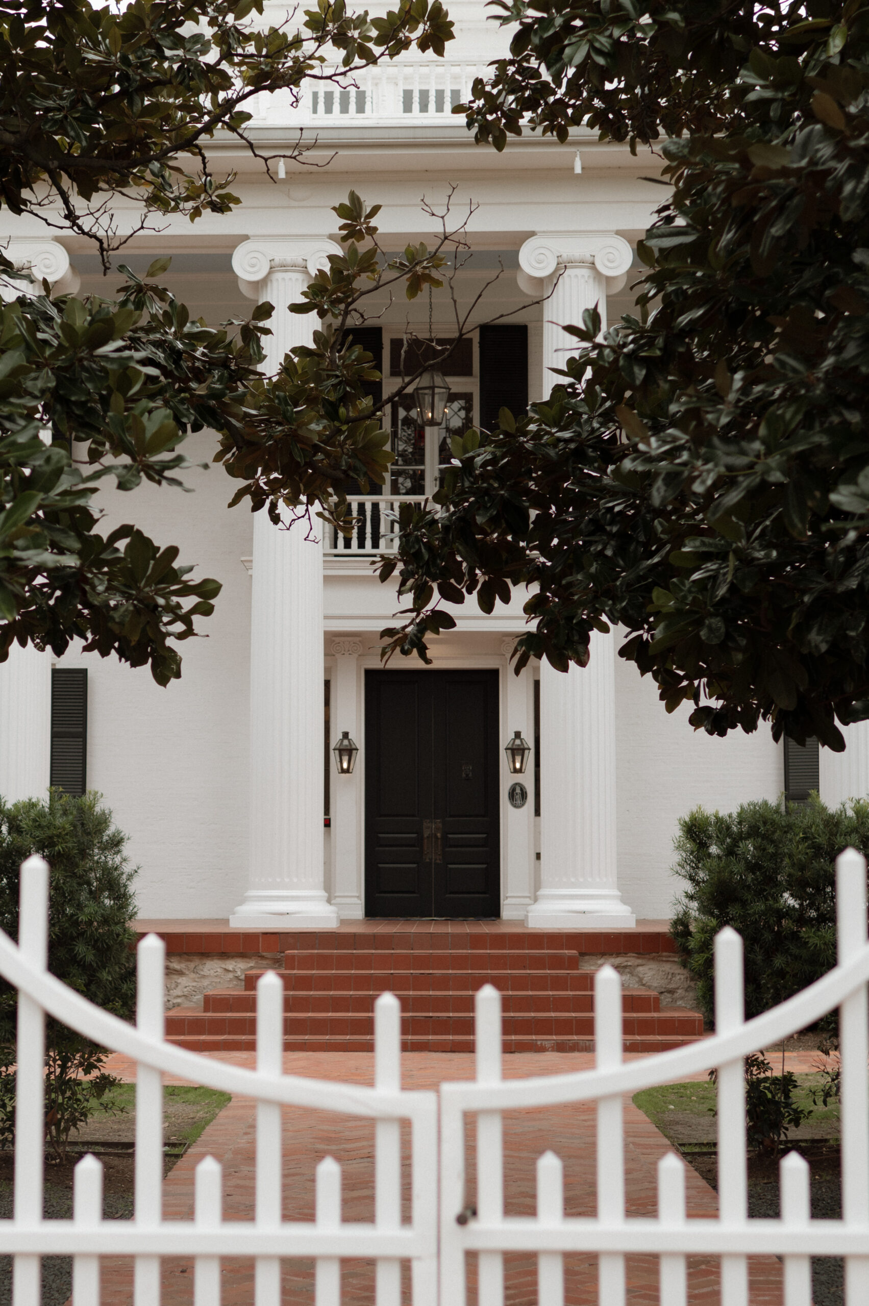 Photo of the front of Woodbine Mansion taken by top Austin wedding photographer Nicole Endress Photography