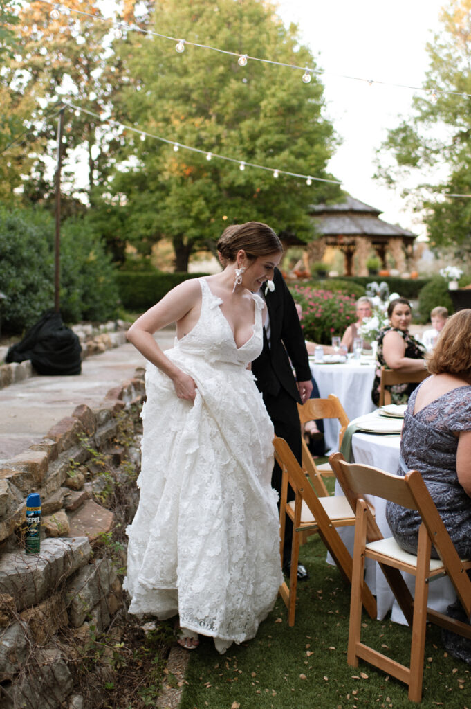 Garden wedding photo of bride and groom taken by Nicole Endress Photography