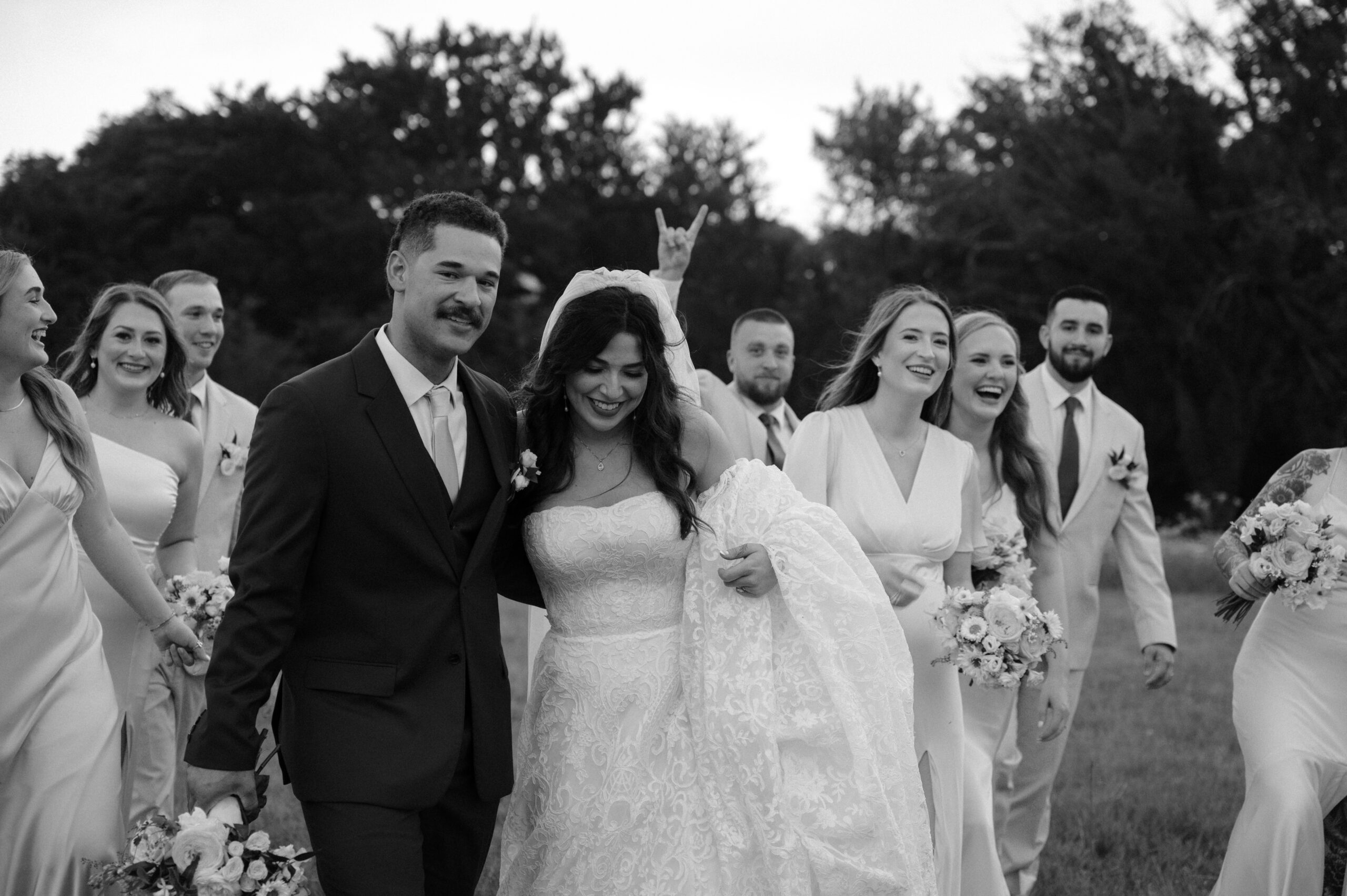 bride and groom with wedding party