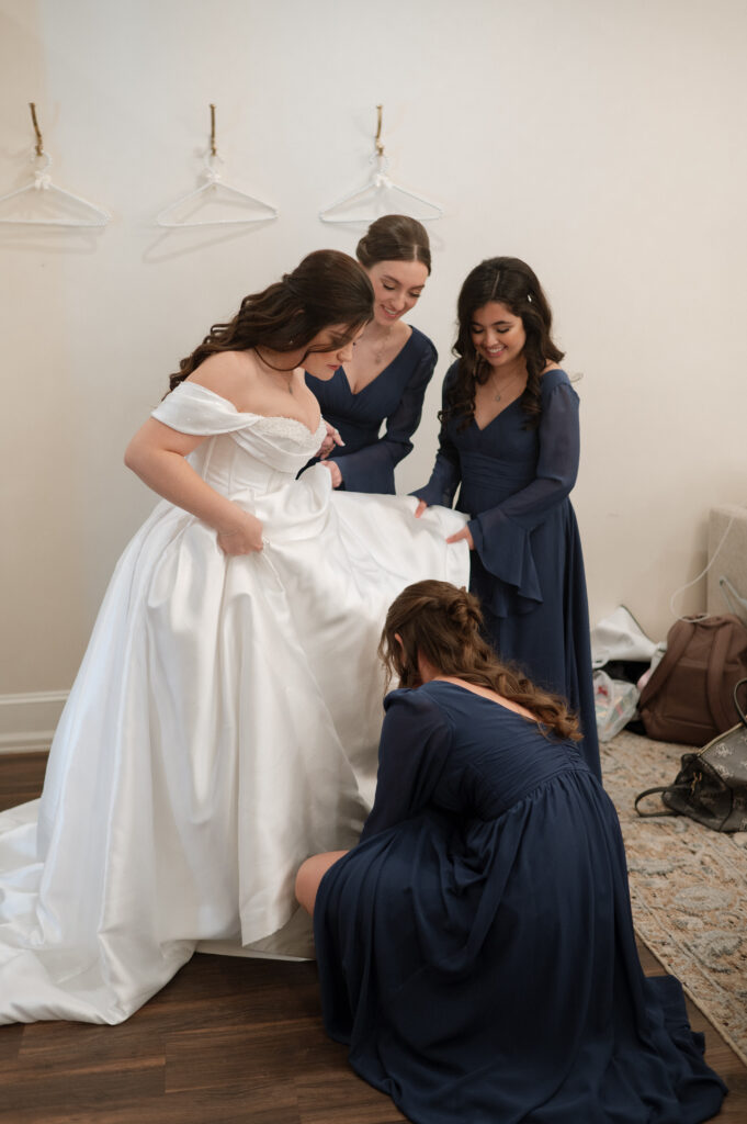 Bride and bridesmaids getting ready taken by Dallas wedding photographer
