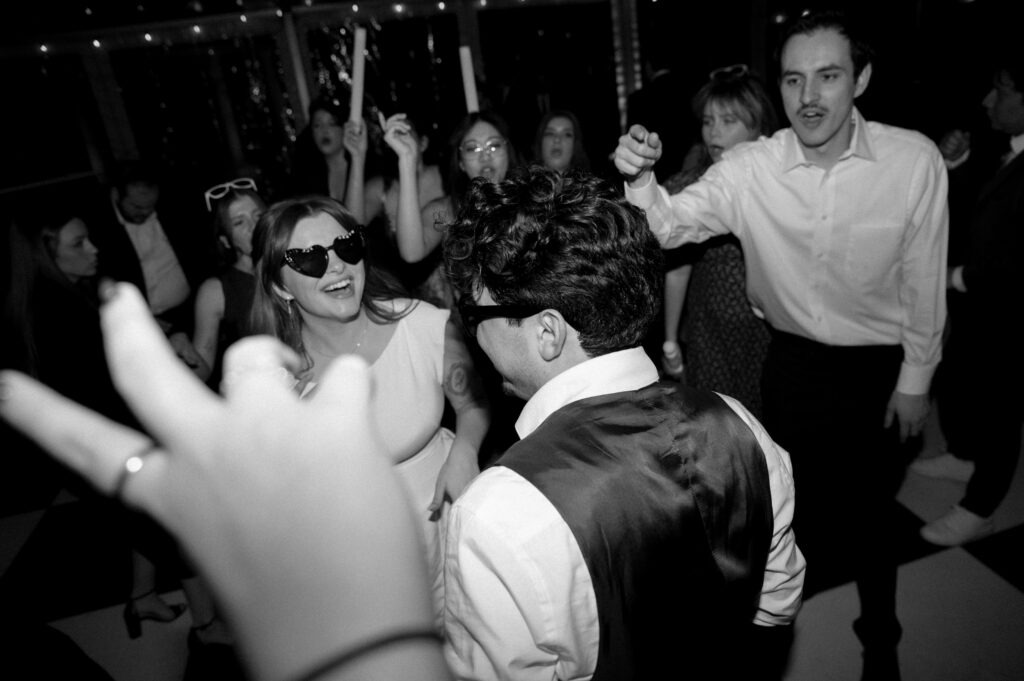 bride and groom on the dance floor having fun
