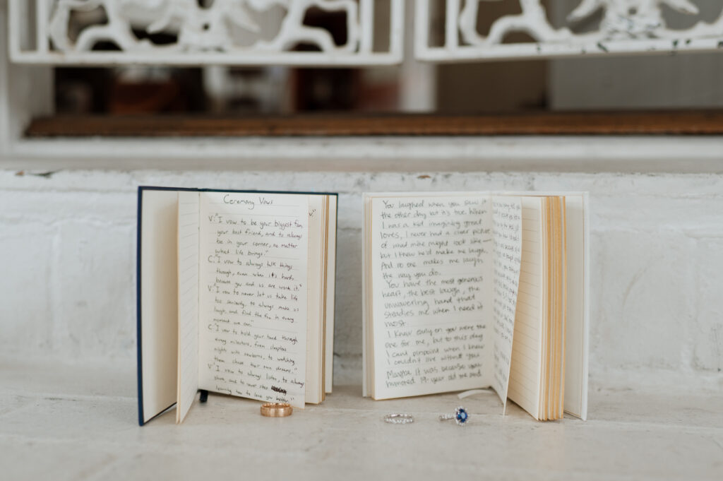 photo of vow books and wedding rings taken by Austin wedding photographer