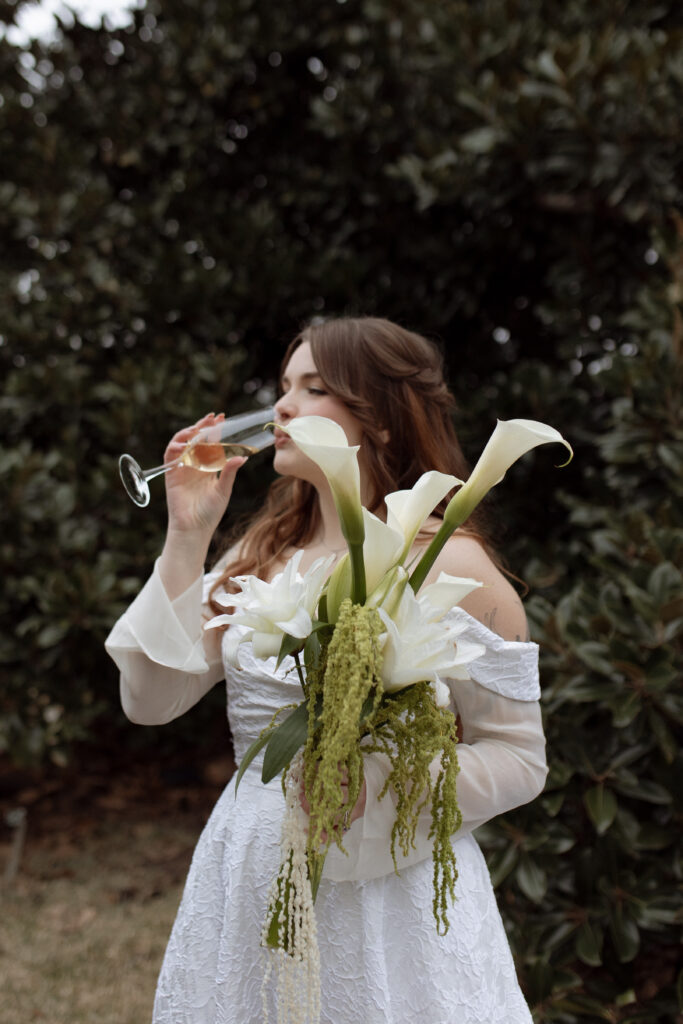 bride drinking champagne