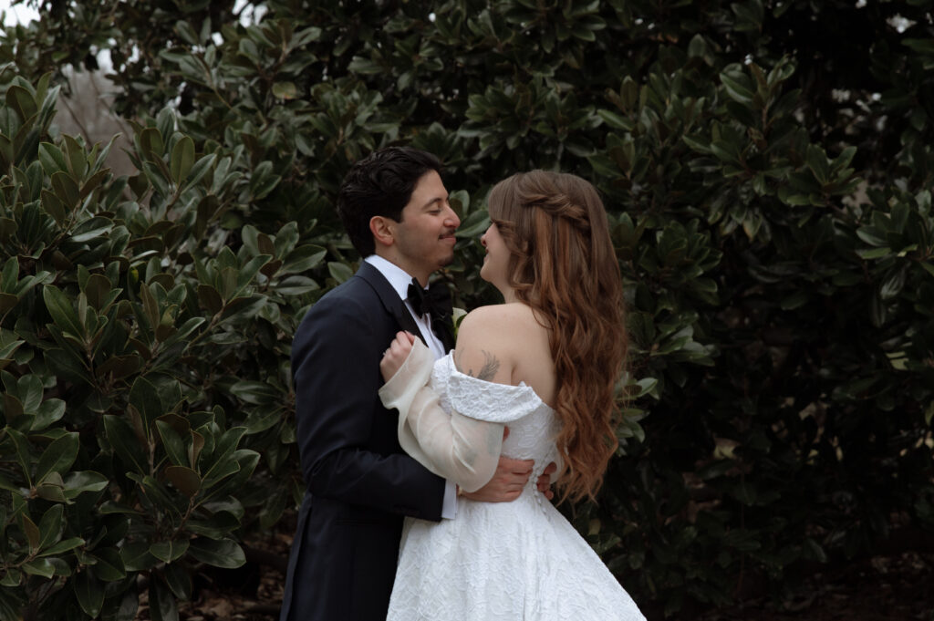 bride and groom snuggling taken by Austin Wedding Photographer
