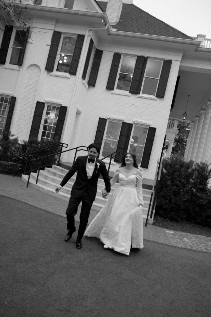 bride and groom walking to their reception