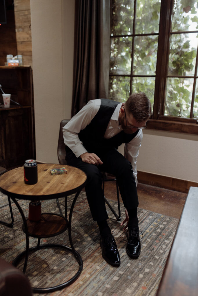 Photo of groom getting ready taken by Dallas Wedding Photographer