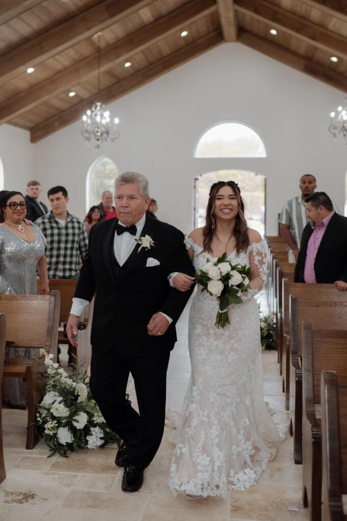 Bride walking down the aisle with her father