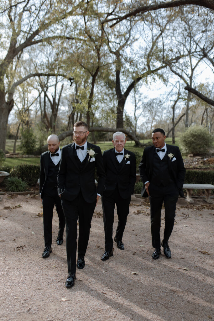 groom and groomsmen walking