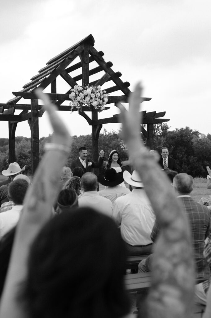 bride and groom celebrating just getting married