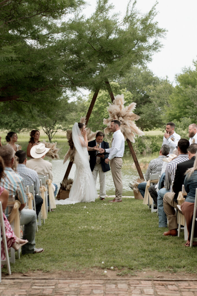 bride crying during wedding ceremony in Dallas, TX