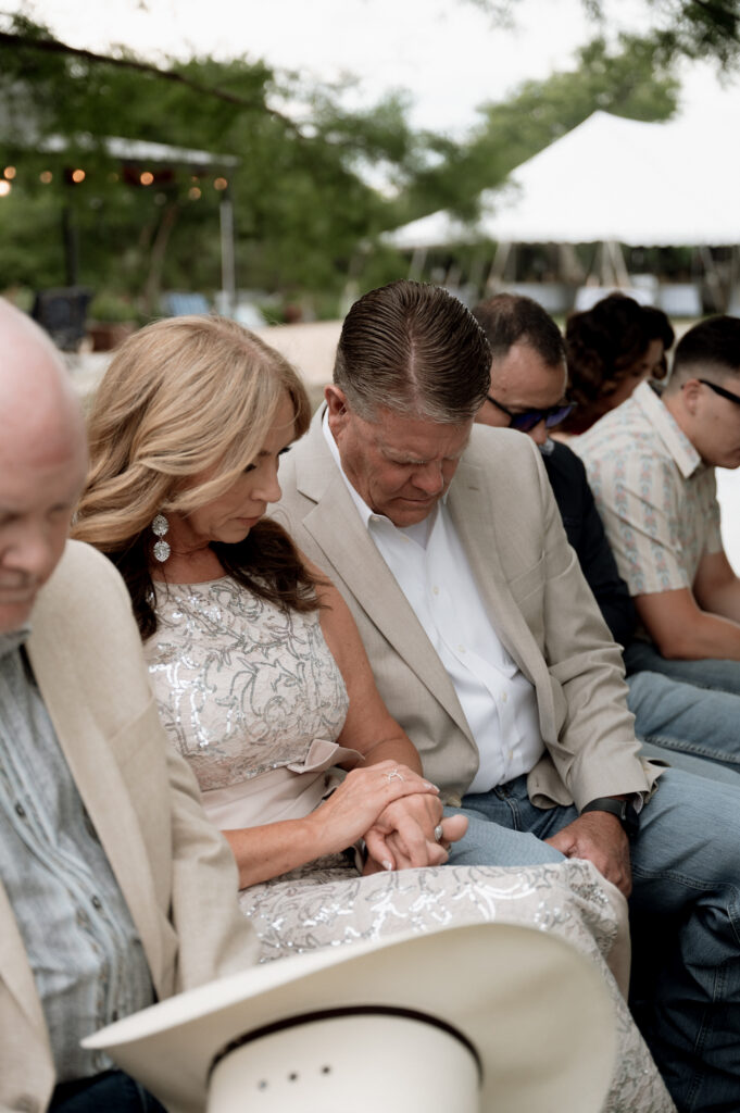 photo of bride's parents during the wedding ceremony