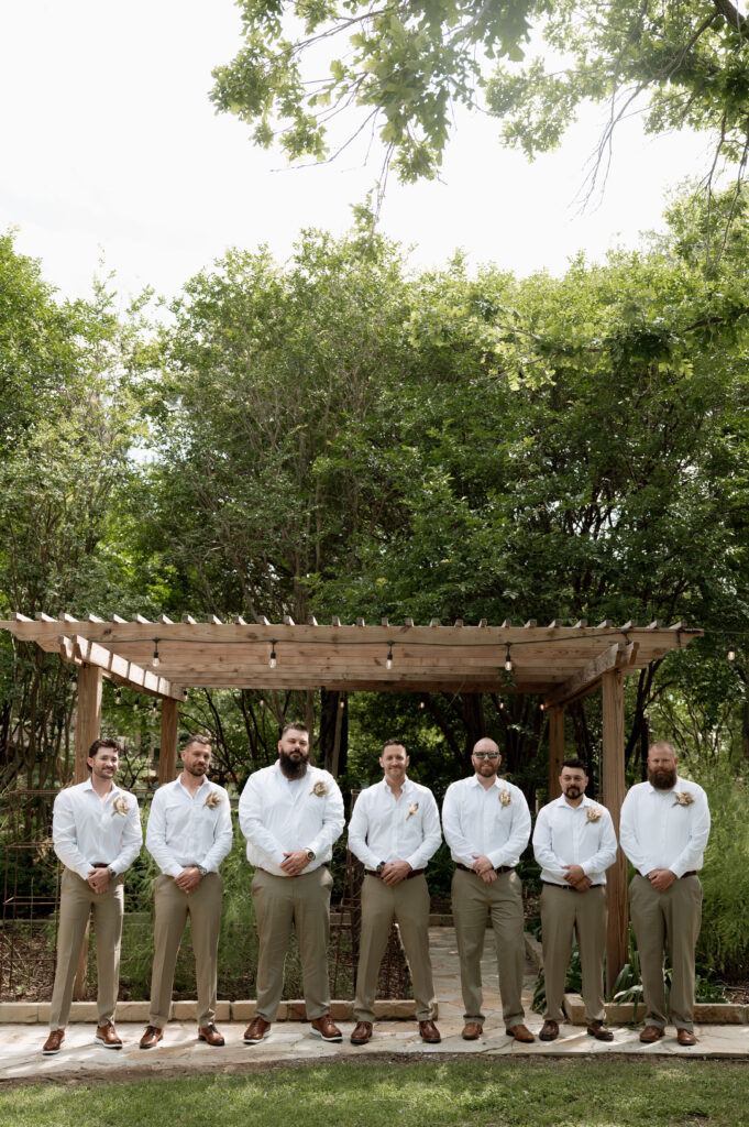 photo of groom and groomsmen lined up together