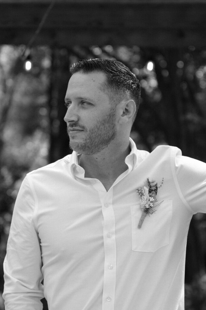 portrait of groom taken by Dallas Wedding Photographer