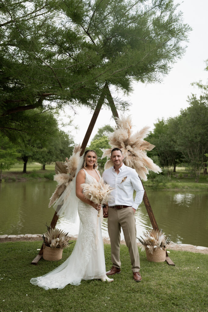 bride and groom standing at the altar taken by DFW wedding photographer