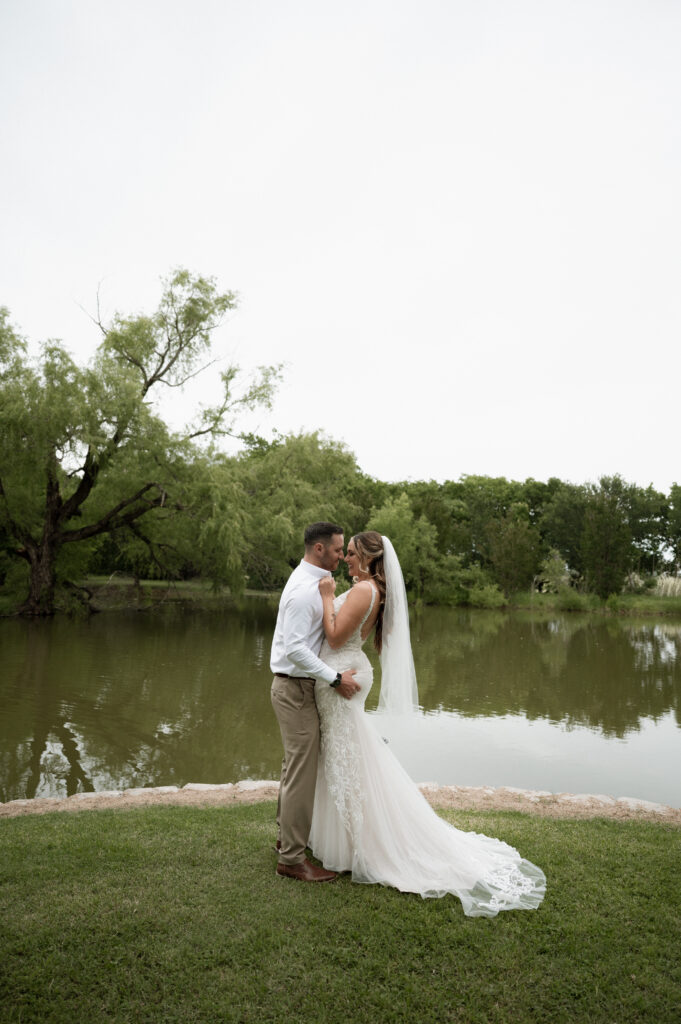 cutesy photo of bride and groom at their Dallas wedding
