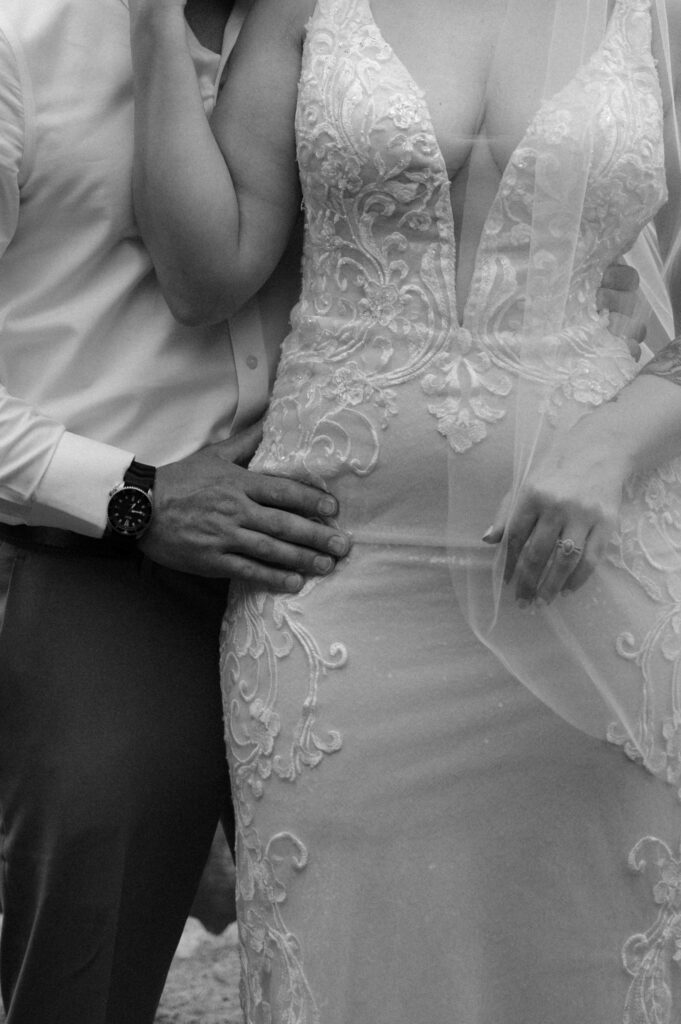 groom and bride hand detail photo