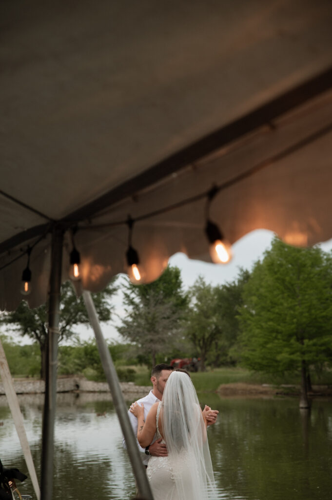 bride and groom first dance at backyard wedding