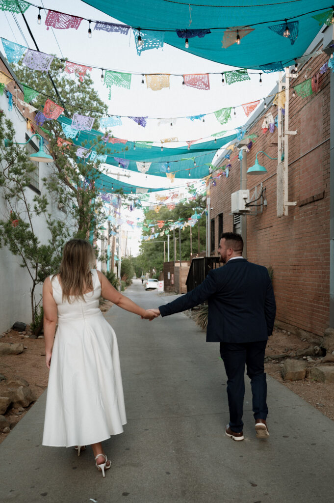 couple walking together in Bishop Arts District