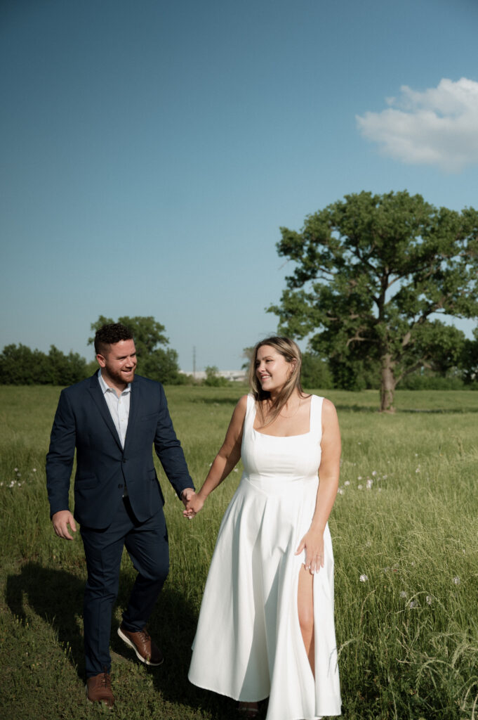 couple walking at Trinity Overlook Park in Dallas, TX