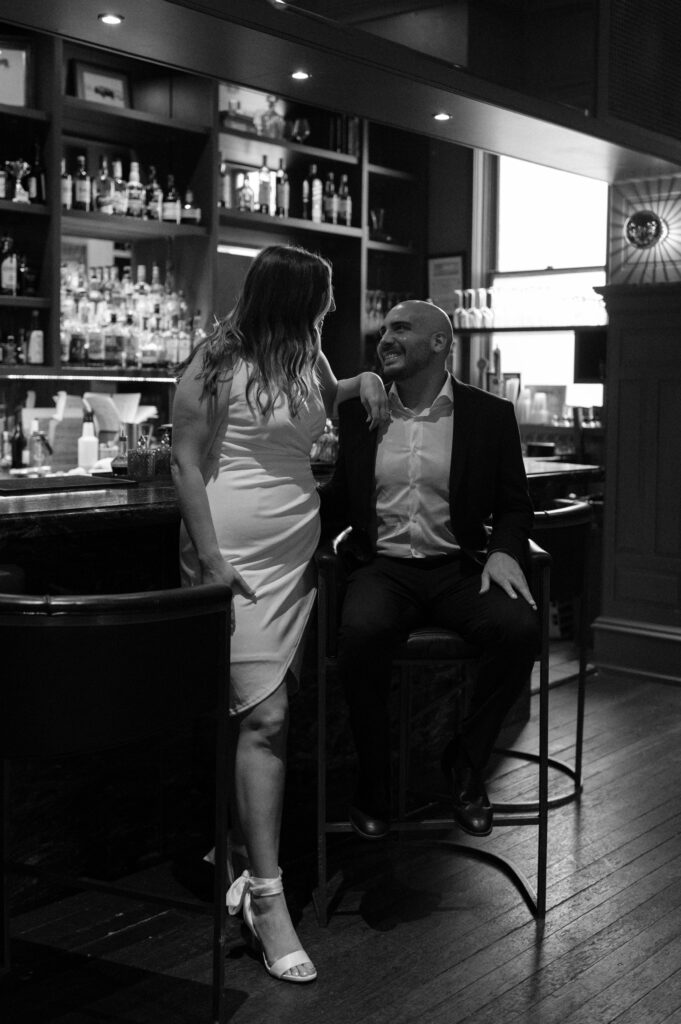 engagement photos at the bar inside Hotel Ella
